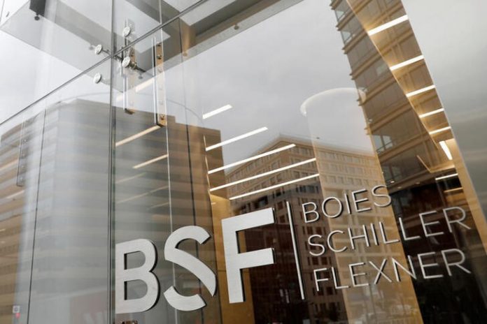 The logo of law firm Boies Schiller Flexner LLP is seen outside of their office in Washington, D.C.